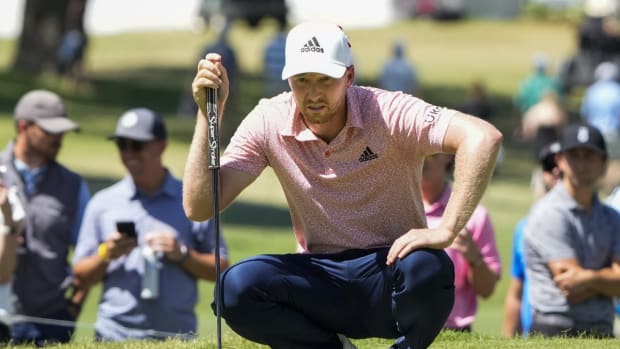 May 26, 2022; Fort Worth, Texas, USA; Daniel Berger lines up a putt on the tenth green during the first round of the Charles Schwab Challenge golf tournament. Mandatory Credit: Jim Cowsert-USA TODAY Sports